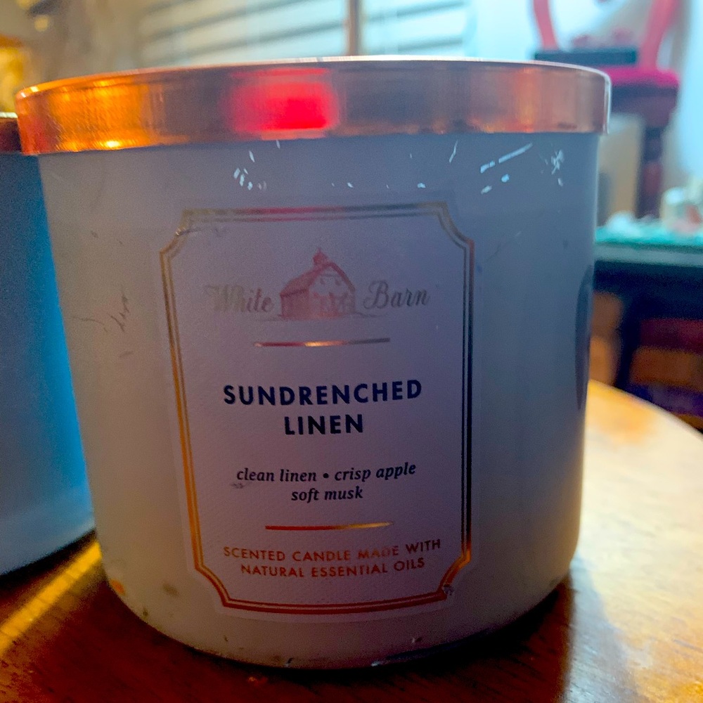 Sun drenched linen white barn candle. Brand new. Never used.